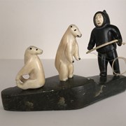 Cover image of Hunter with Two Ivory Bears